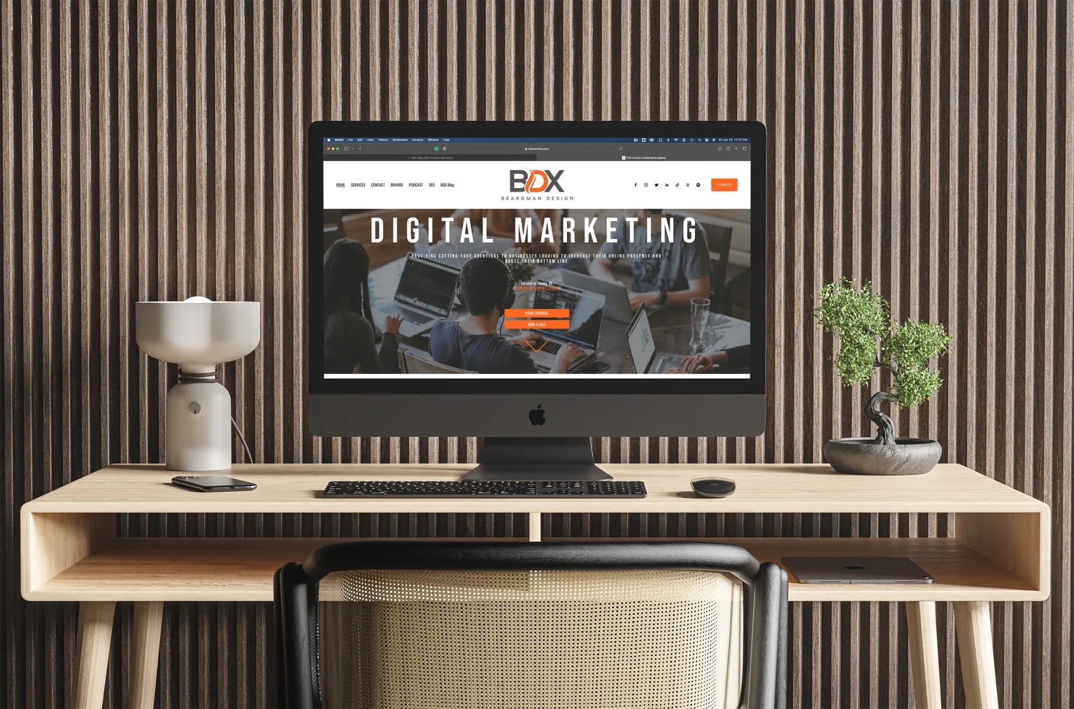 Modern office iMac displaying a BDX Omaha small business web design services project